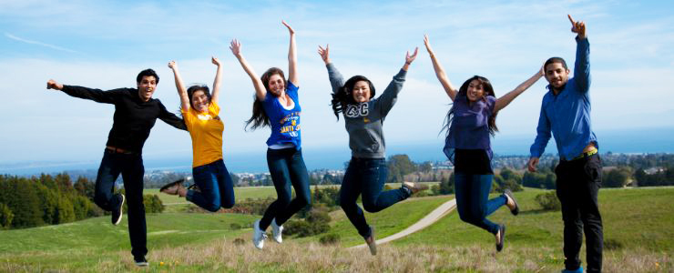 Happy students jumping